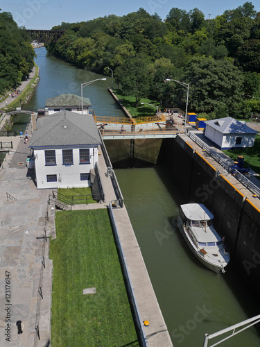 Pleasure boat in a lock on the Erie Canal, Lockport, New York State, USA