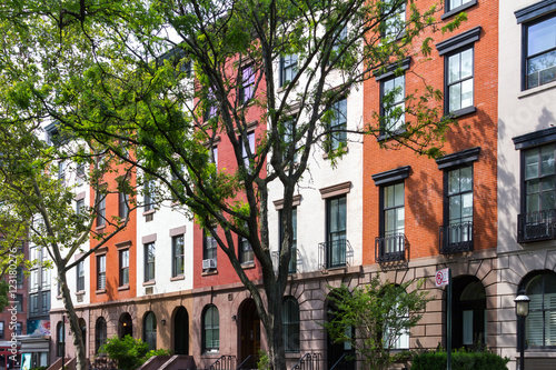 Block of Apartment Buildings on a Tree Lined Street in Manhattan New York City © deberarr