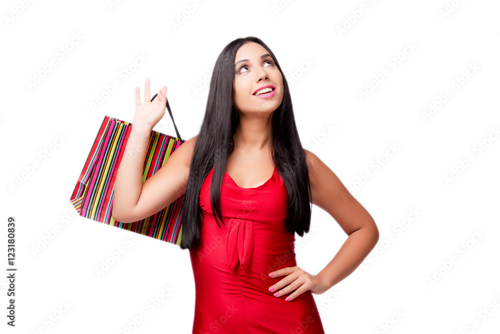 Woman in red dres after shopping isolated on white Woman in red dres after shopping isolated on white