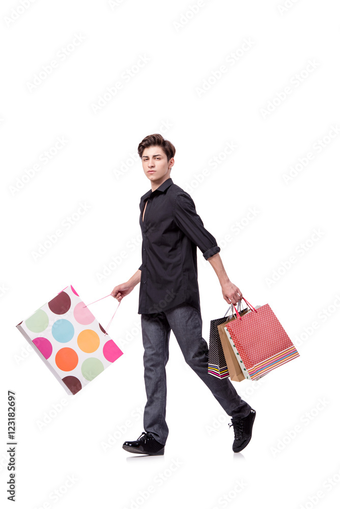 Young man in shopping concept isolated on white Young man in shopping concept isolated on white