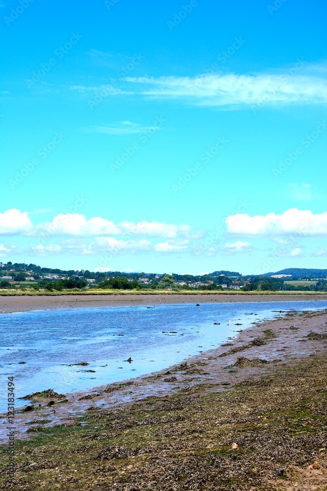 View across the River Axe towards the surrounding countryside, Axmouth. View across the River Axe towards the surrounding countryside, Axmouth.