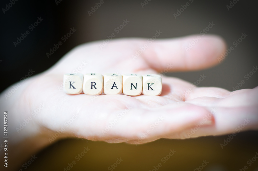 Krank, symbolisch, Würfel auf der Hand Krank, symbolisch, Würfel auf der Hand
