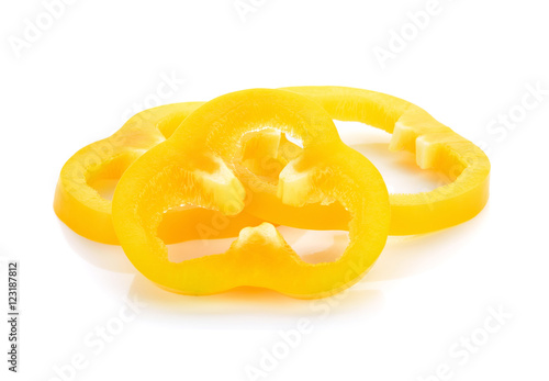 Sliced yellow paprika pepper isolated on white