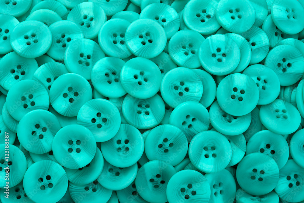 Green plastic button background