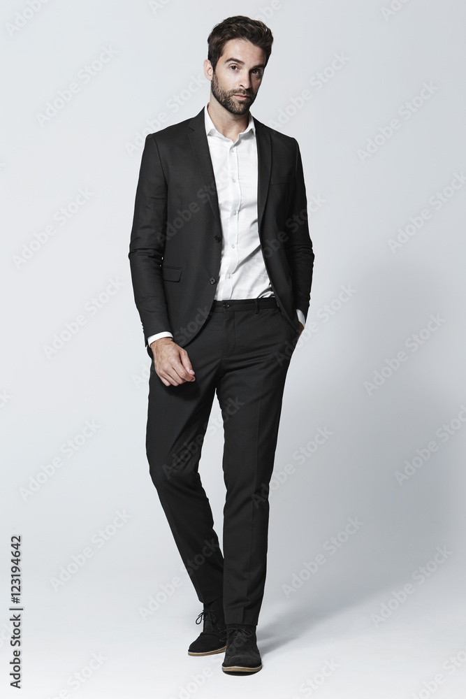 Smart dressed man in black suit, portrait Smart dressed man in black suit, portrait