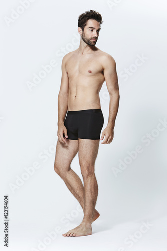 Guy in shorts against white background