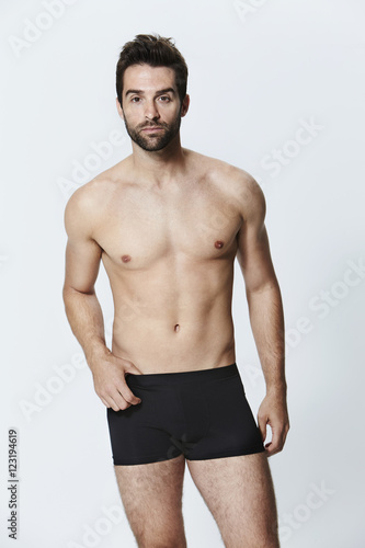 Man in black underwear shorts, portrait