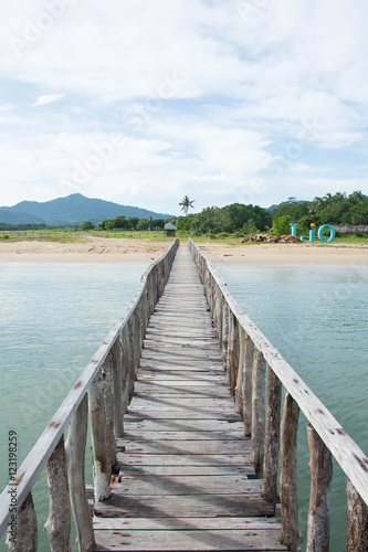 a wooden platform across the beach line, use for crossing to boat to beach upon high tide or low tide