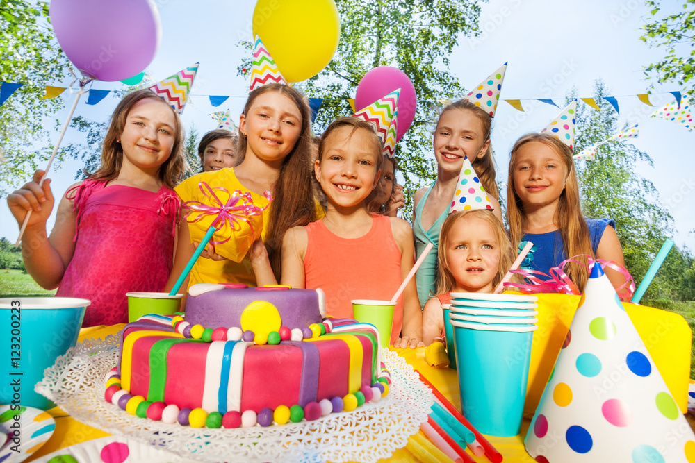 Group of adorable kids having fun at B-day party Group of adorable kids having fun at B-day party