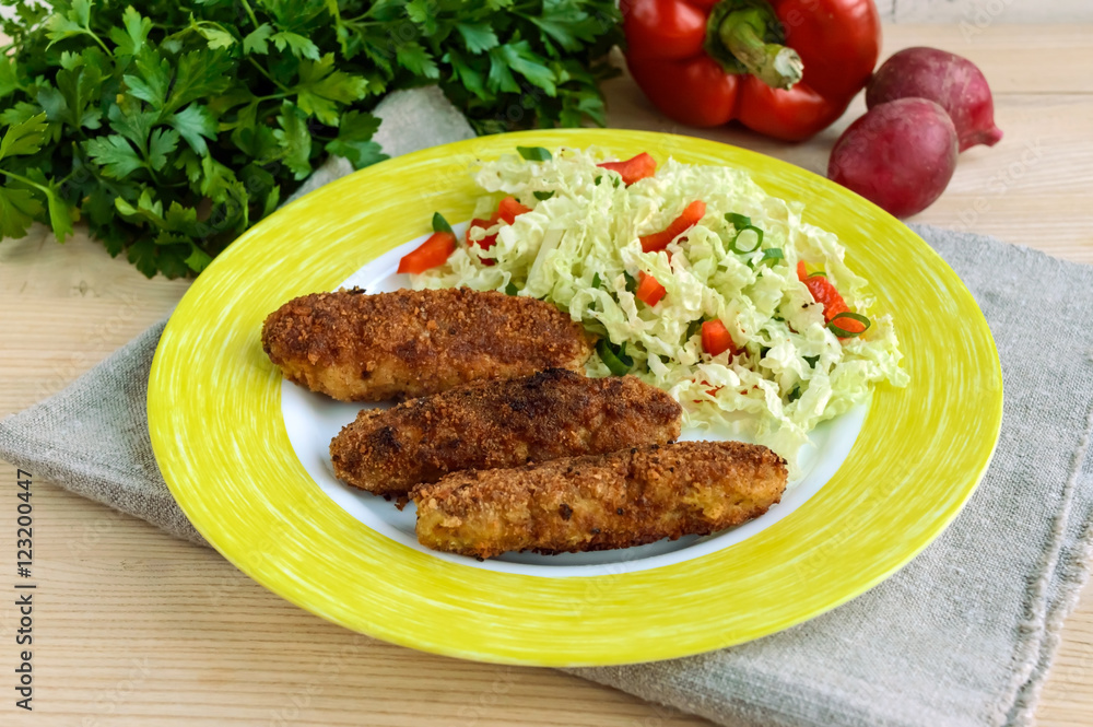 Meat cutlet with a salad of cabbage, peppers and herbs. Meat cutlet with a salad of cabbage, peppers and herbs.