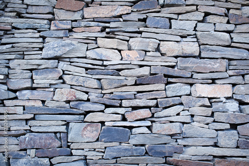 old Natural stone wall texture for background