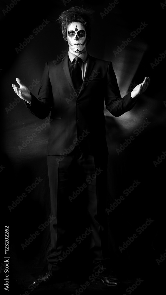 young guy with make-up for Halloween in a studio