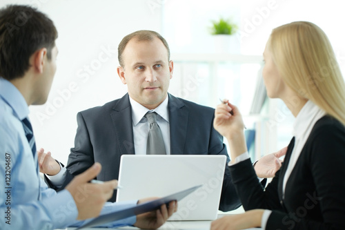 Wallpaper Mural Business people submitting proposals at meeting Torontodigital.ca