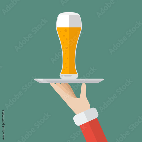 Santa Claus serving a glass of beer