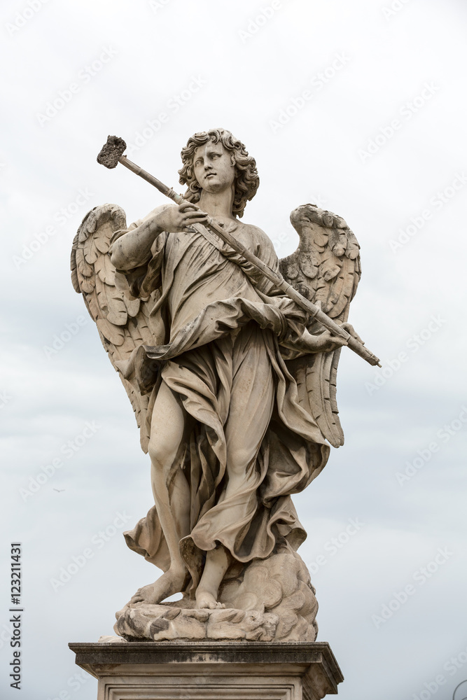 Fototapeta premium Marble statue of Angel with the Sponge by .Antonio Giorgetti from the Sant'Angelo Bridge in Rome, Italy,