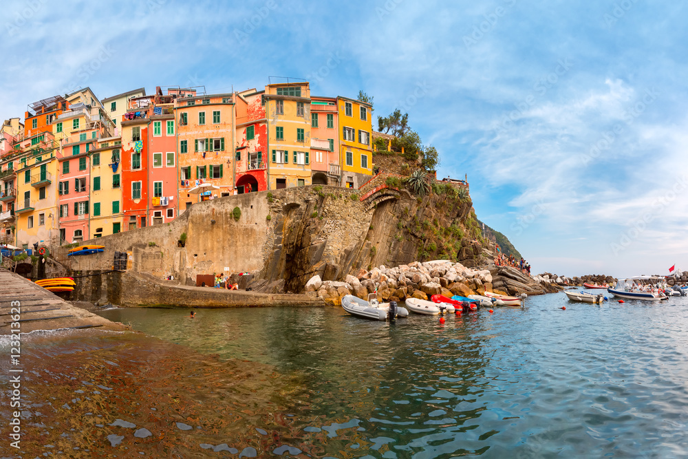 Riomaggiore fishing village in Five lands, Cinque Terre National Park in the evening, Liguria, Italy.