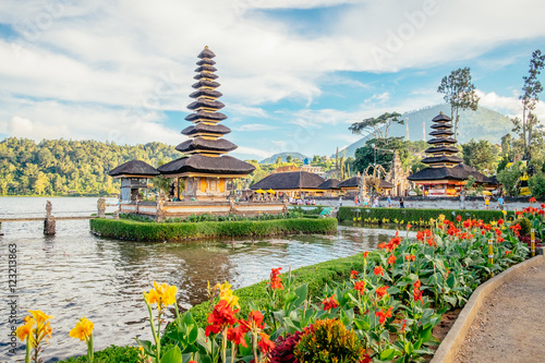 Pura Ulun Danu Bratan, Hindu temple surrounded by flowers on Bratan lake is a major Shivaite and water temple in Bali, Indonesia. Asia landmark