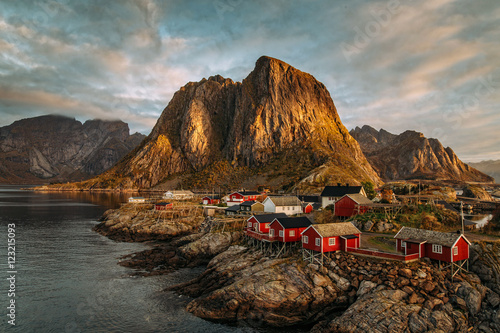 Fishing hut at spring sunset - Reine, Lofoten islands, Norway