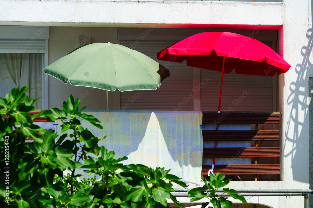 House with balcony on sea resort, sunny day, touristic concept.