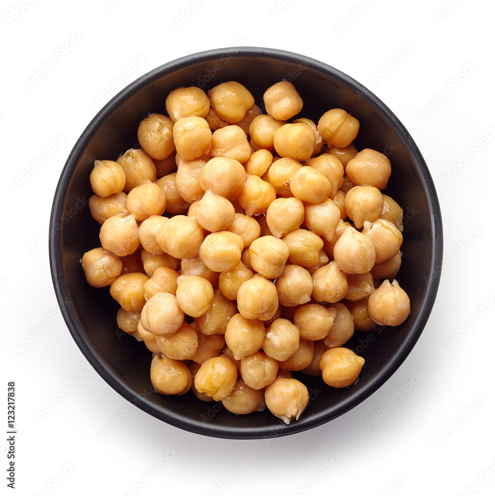 Black bowl of chickpeas isolated on white, from above Black bowl of chickpeas isolated on white, from above