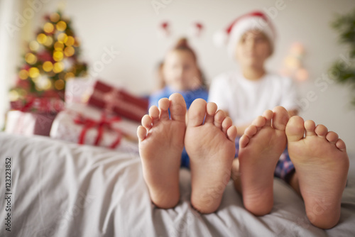 Kids feet in the bed at Christmas