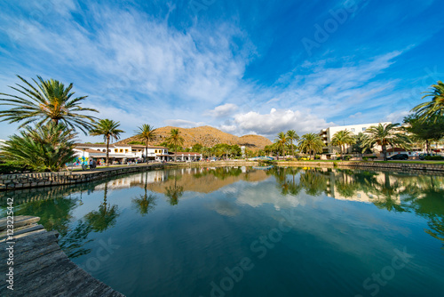 lake, palm trees and mountain