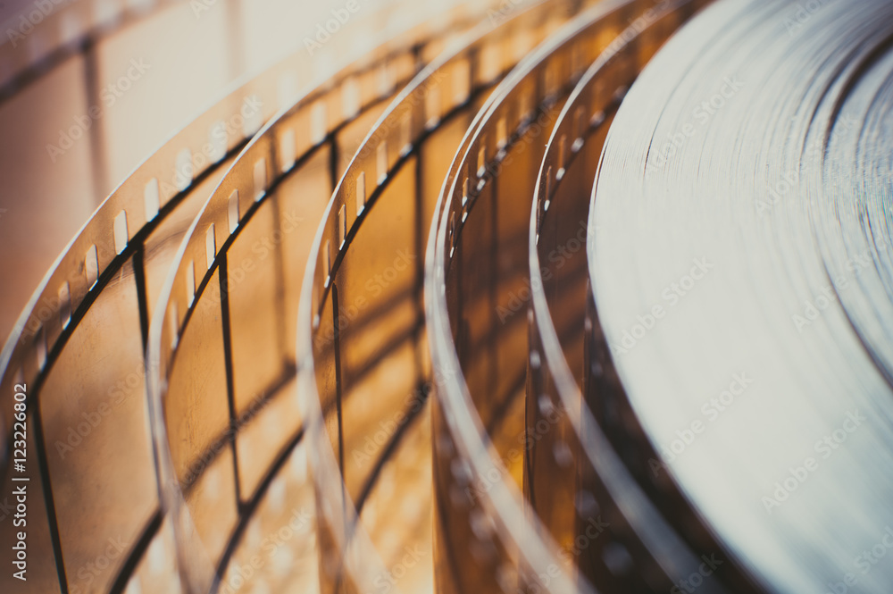 Fototapeta premium Movie film reel detail, unrolled film close up