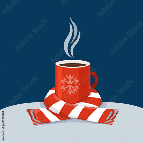 Hot coffee in red cup. Cup of coffee swathed in scarf. Winter ba