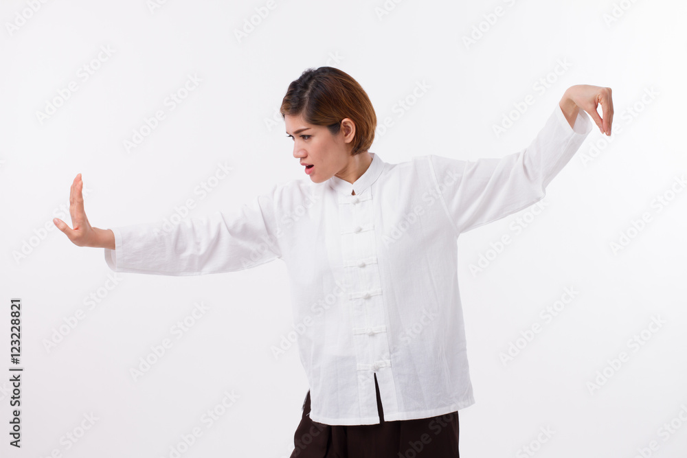 active, strong, confident asian woman practice kungfu or tai chi quan, baguazhang, chinese martial arts concept active, strong, confident asian woman practice kungfu or tai chi quan, baguazhang, chinese martial arts concept