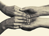 Men's hands hold the female palms  on  toned background. This Image isolated for easy  transfer in your design.