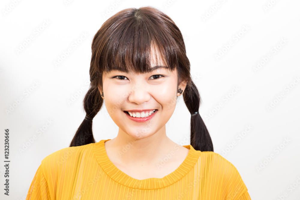 Young beautiful amilling asian sexy female with yellow shirt Young beautiful amilling asian sexy female with yellow shirt
