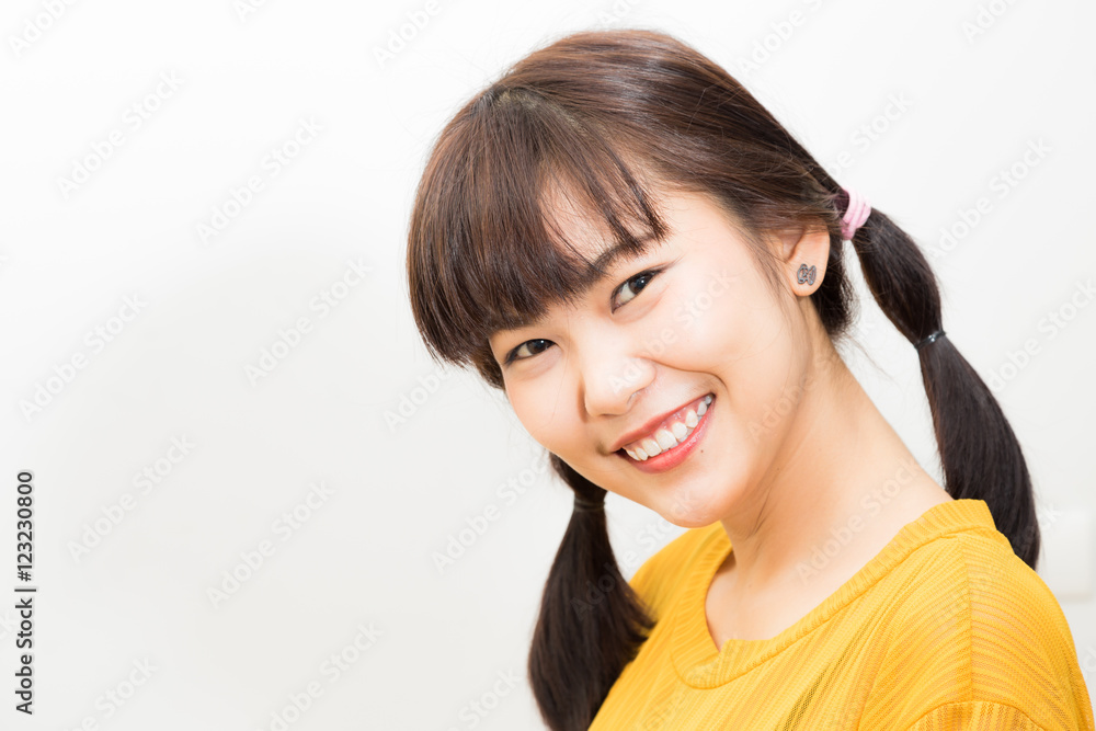 Young beautiful amilling asian sexy female with yellow shirt Young beautiful amilling asian sexy female with yellow shirt