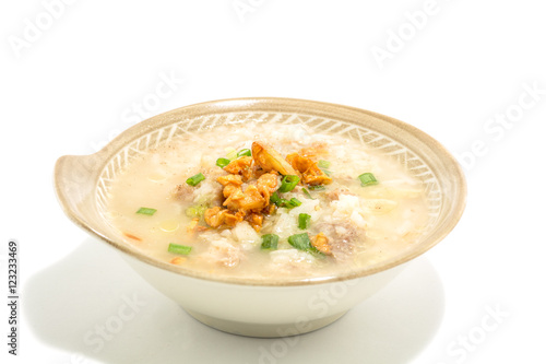 Thai rice soup on white background.