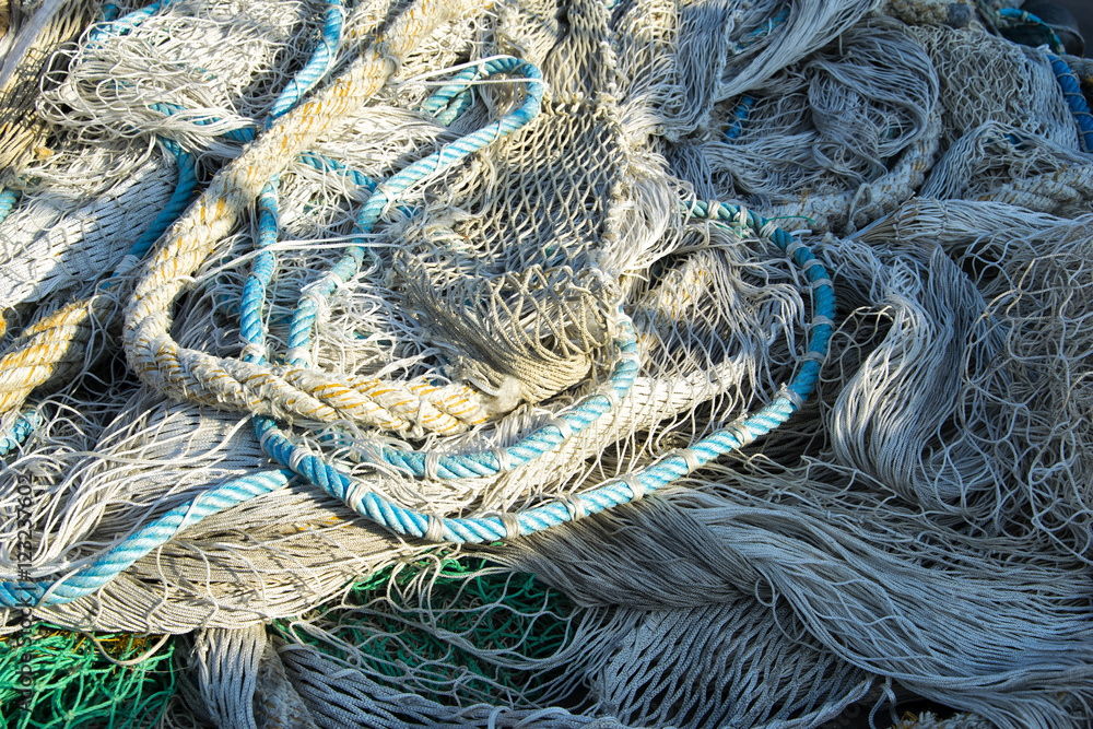  Fishing nets and buoys on mediterranean fisher harbour.