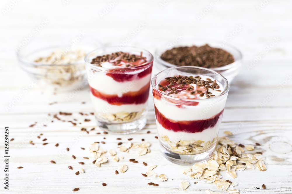 Homemade yogurt with berry jam, linseed and oat flakes Homemade yogurt with berry jam, linseed and oat flakes