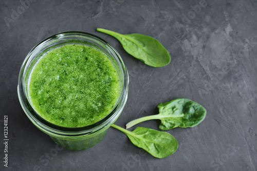 Green smoothie of fresh spinach