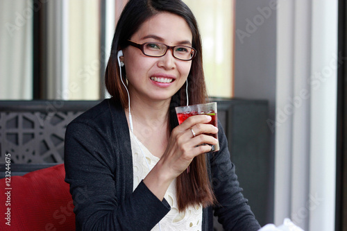 businesswoman beautiful young woman drinking red water