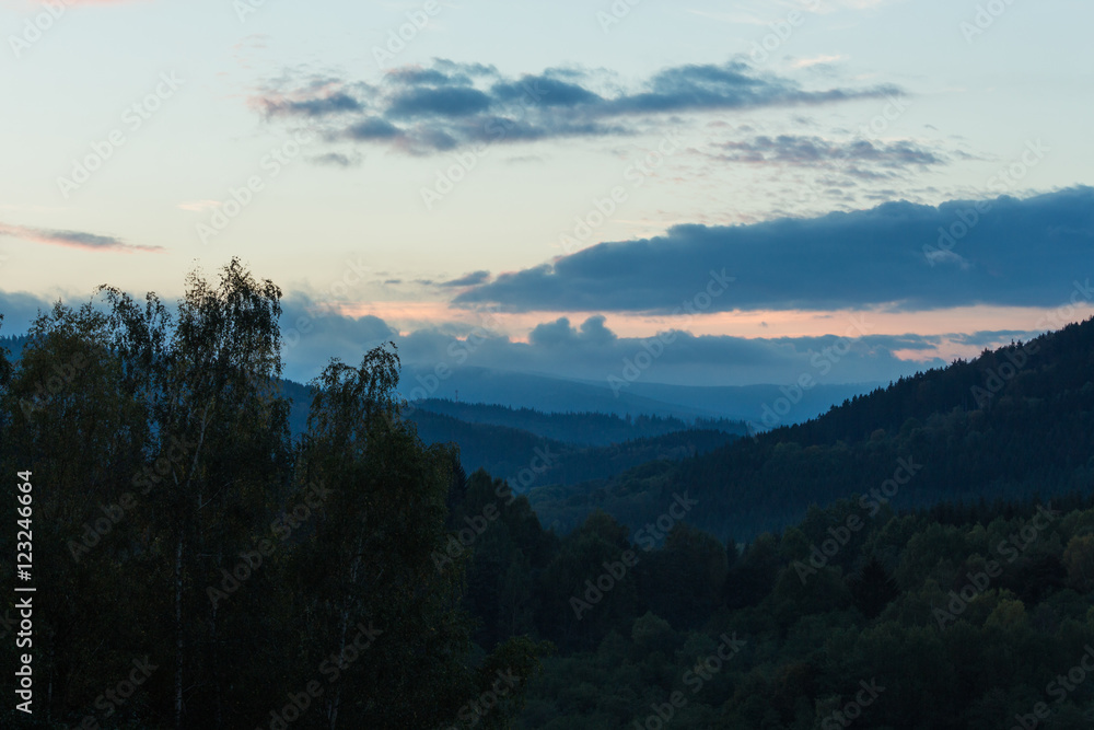 Fototapeta premium Summer landscape in mountains and the dark blue sky with clouds