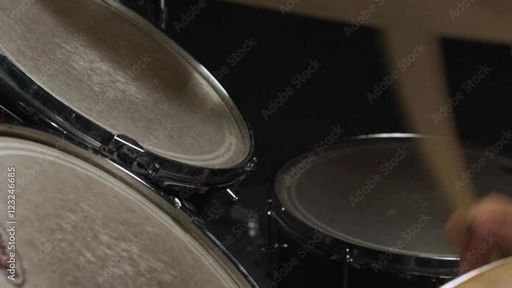Close up view of drumsticks beating drum Slow motion Close up view of drumsticks beating drum Slow motion