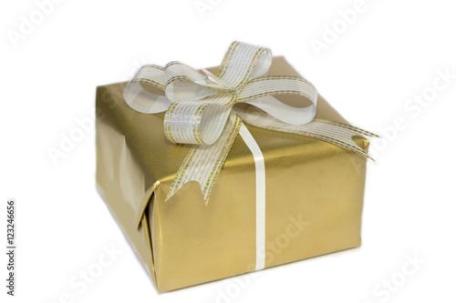 gold gift box with ribbon isolated on white