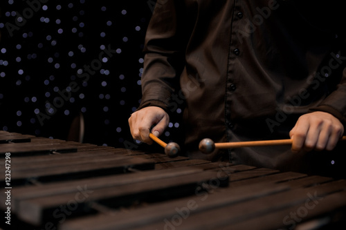 Musician hand playing the xylophone 