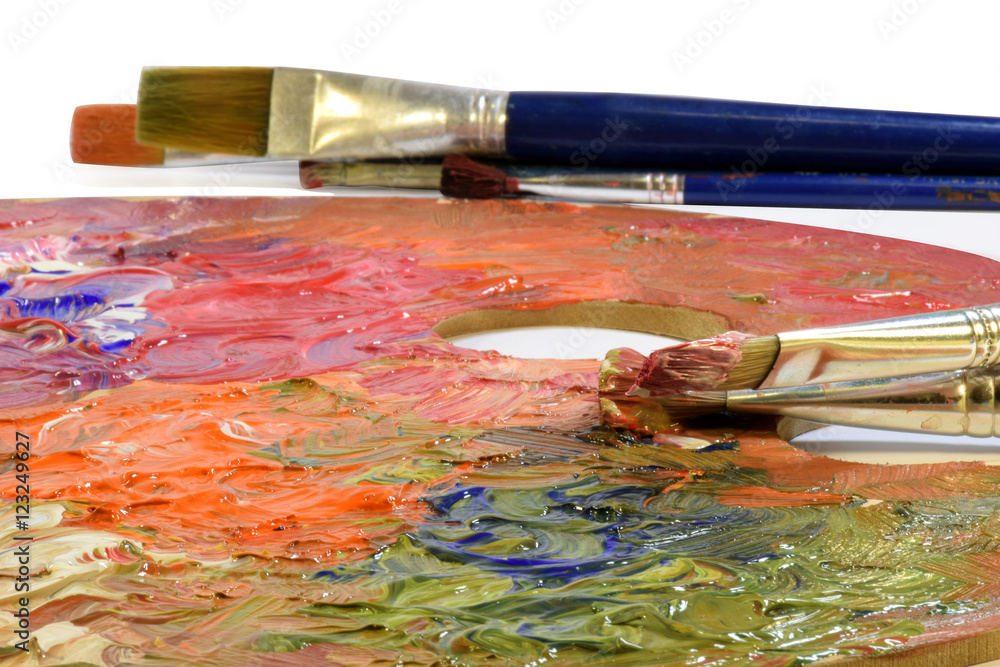 Colors on palette and paint brushes Colors on palette and paint brushes
