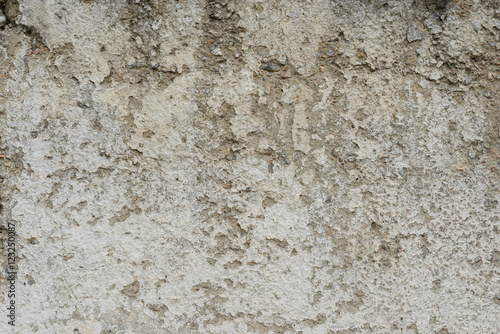 Wall fragment with scratches and cracks