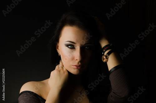 Portrait of beautiful young woman with makeup