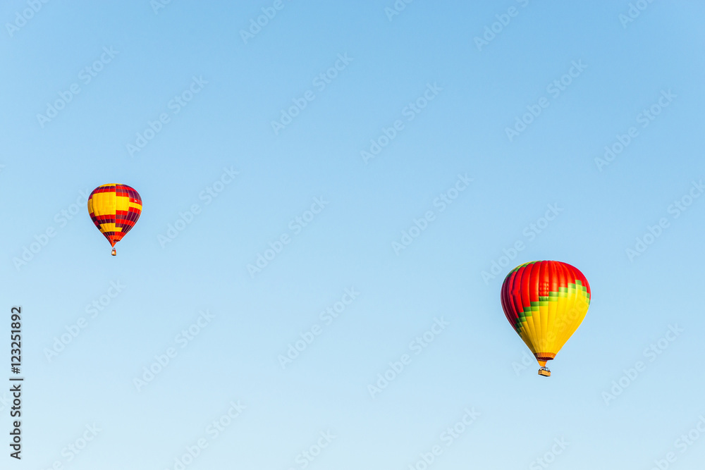 Obraz premium Air balloons above the clouds