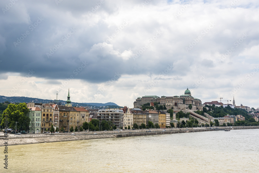 Old colorful houses on Buda side and Budapest Royal palace. Hungary.
