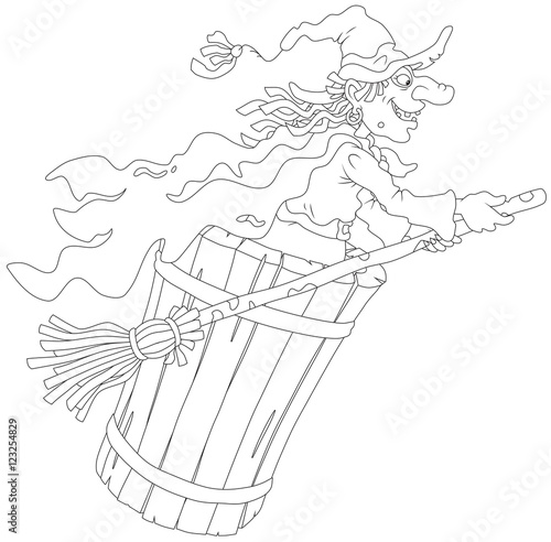 Halloween witch flying with her old broom and mortar