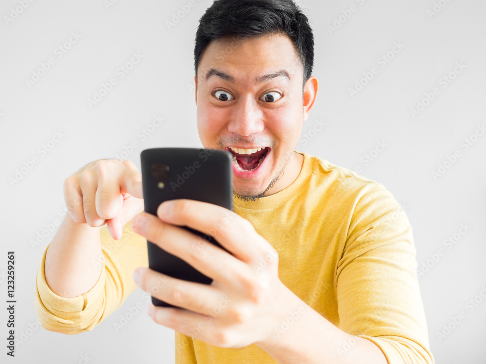 Man plays mobile game. Man plays mobile game.