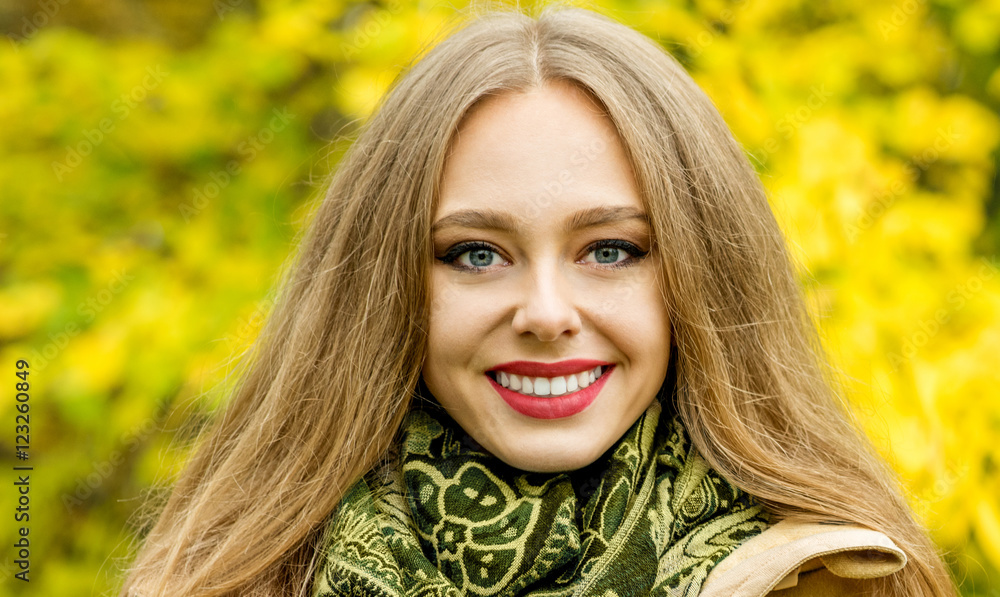 Beautiful elegant woman in autumn park. Fall yellow garden backg Beautiful elegant woman in autumn park. Fall yellow garden backg