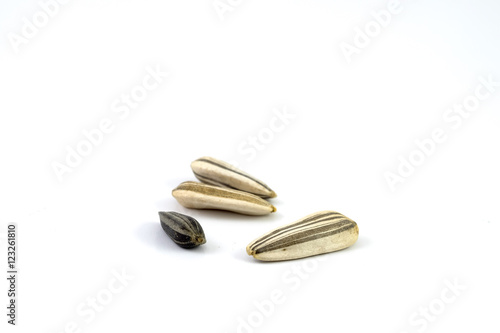 Close up of black sunflower seeds. sunflower (Helianthus annuus) seeds, isolated on white.